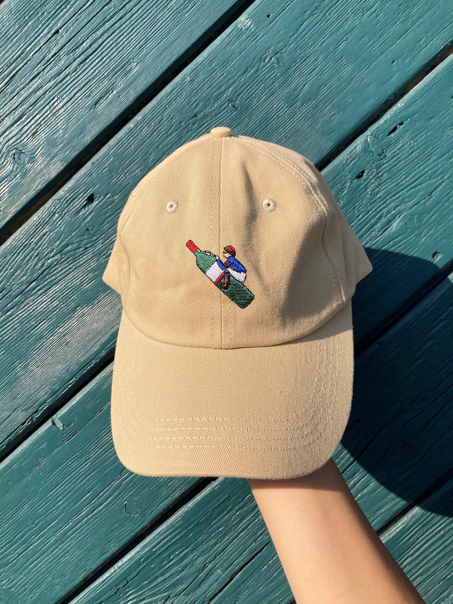 Jockey auf Weinflasche Cap | Beige