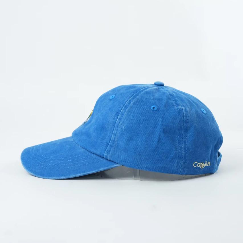 Jockey auf Champagnerflasche Cap | Blau washed | Unisex Dad Hat | Bestickte Kappe